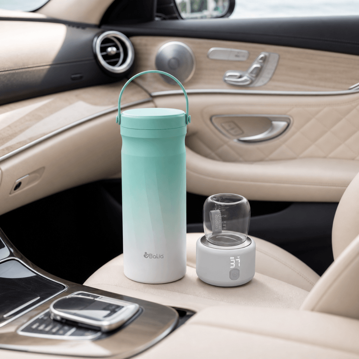 Pack mamá en movimiento: Cooler para leche materna + Calentador portátil de Balia en el asiento de un auto.